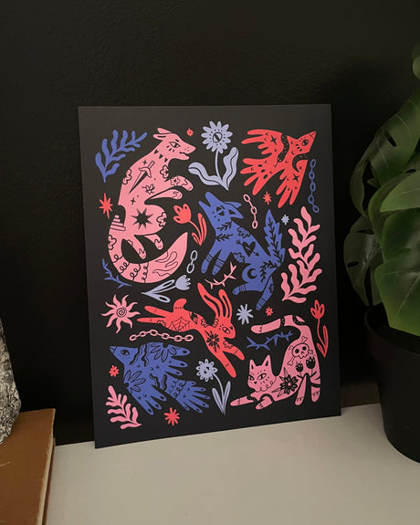 Colorful animal and floral illustration on a black background